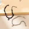 Set de 2 pulseras de acero inoxidable con forma de corazón magnético