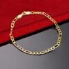 Pulsera de cadena Figaro chapada en oro de 18K- 20cm