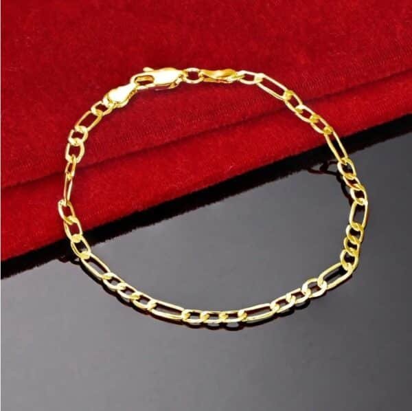 Pulsera de cadena Figaro chapada en oro de 18K- 20cm